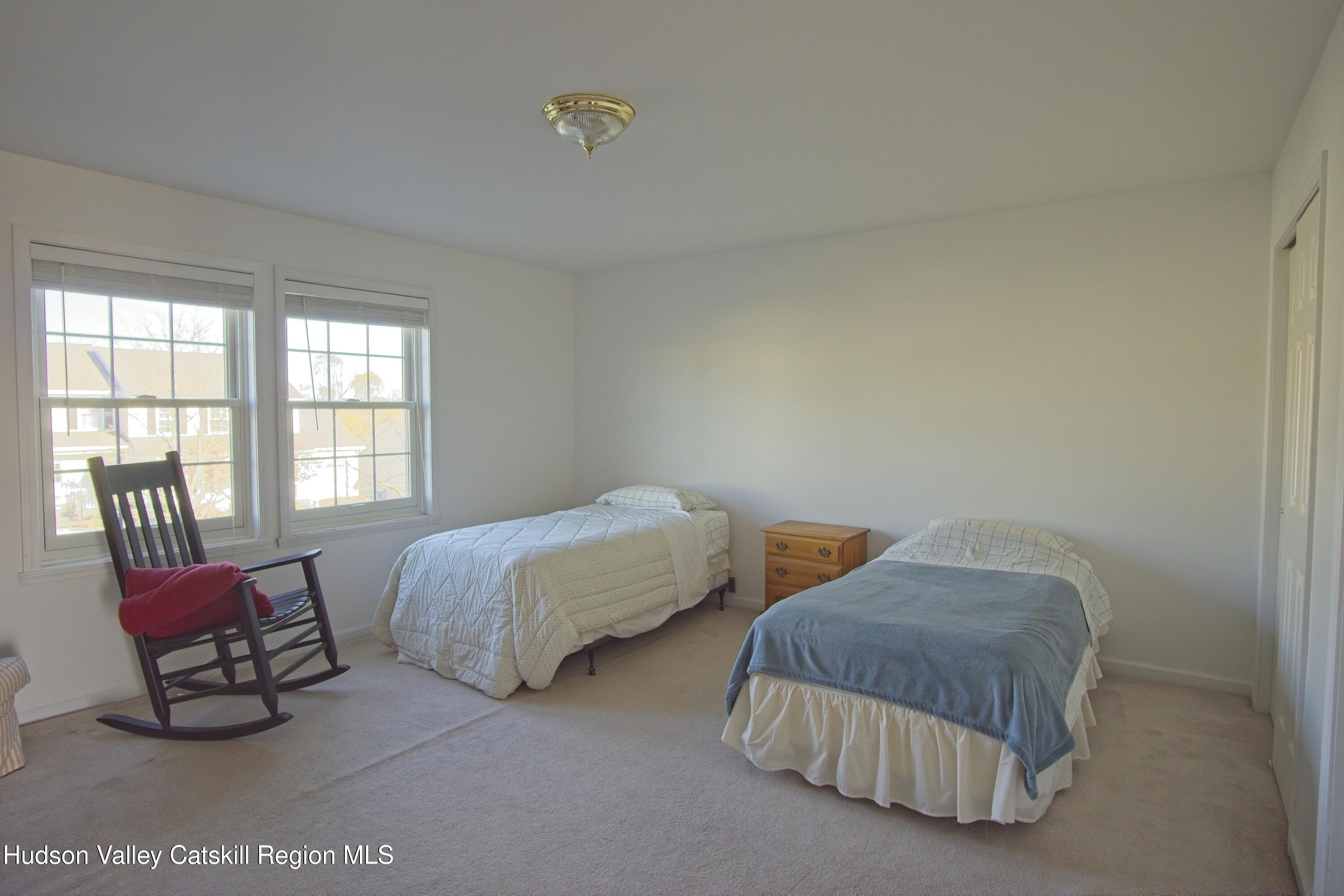 5 Van Winkle Road Hudson, NY 12534 - Photo 10 of 14 a bedroom with two beds and a couch