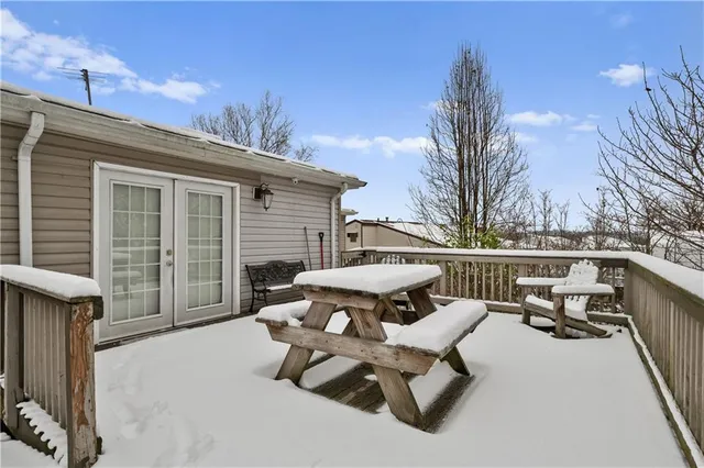 a view of a covered with snow in the yard