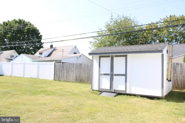 a view of a back yard of the house