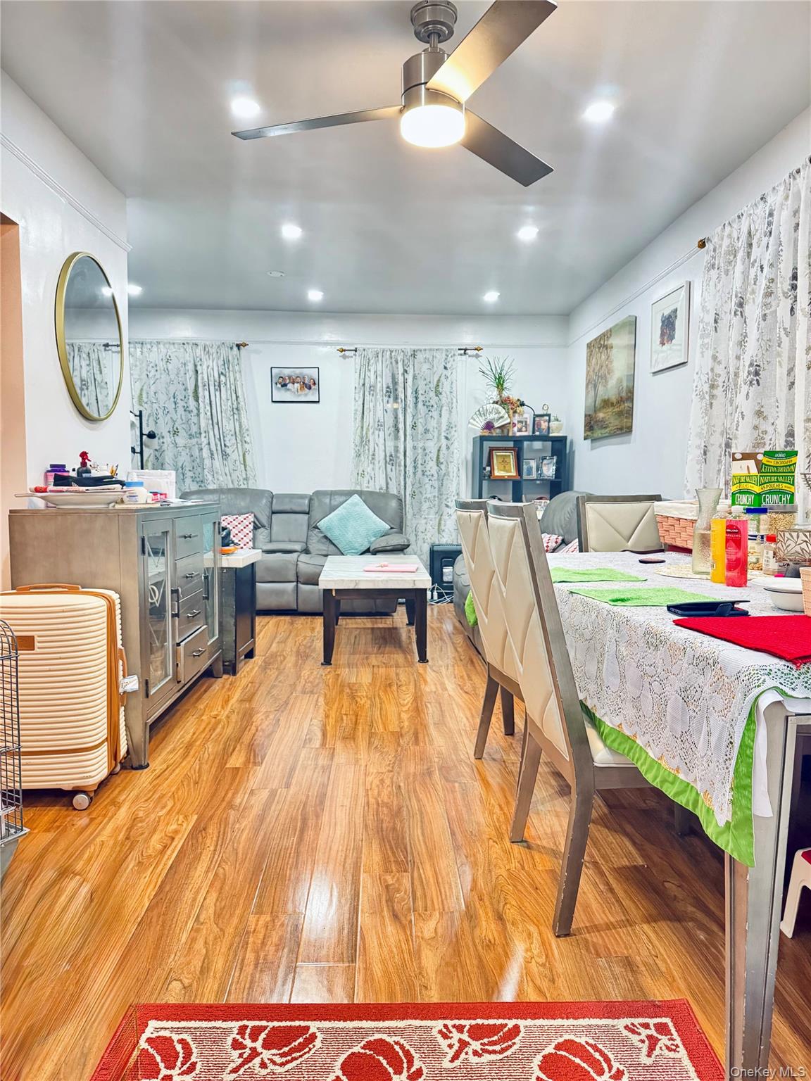 86-29 90th Street Queens, NY 11421 - Photo 5 of 14 Dining area featuring light wood-style floors, a ceiling fan, and recessed lighting