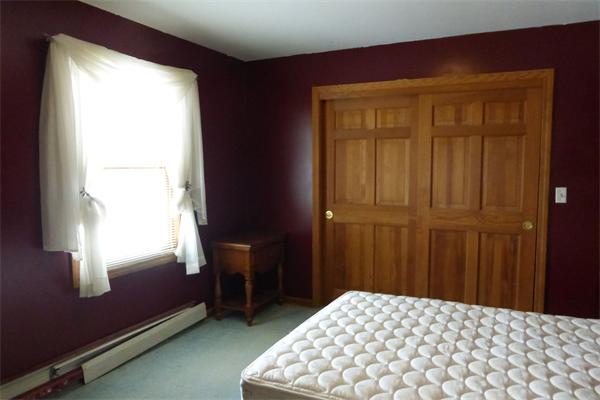 183 Beaman Road Sterling, MA 01564 - Photo 12 of 15 a bedroom with a bed and a window