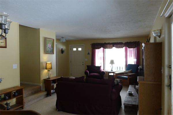 183 Beaman Road Sterling, MA 01564 - Photo 14 of 15 a living room with furniture and a large window