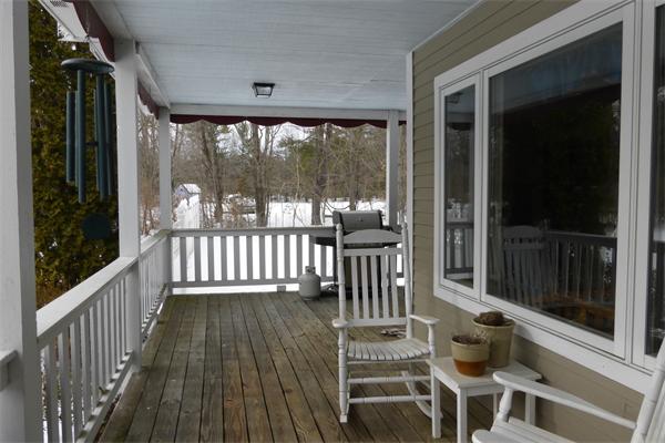 183 Beaman Road Sterling, MA 01564 - Photo 3 of 15 a view of a balcony with chair