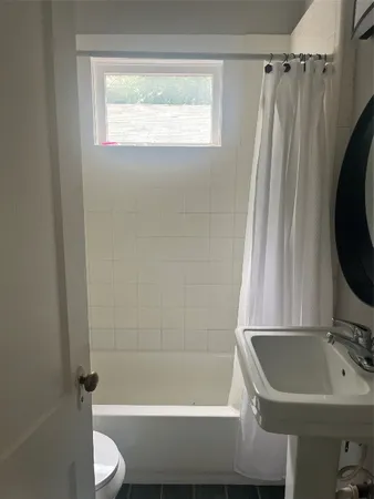 a kitchen with a stove and a refrigerator