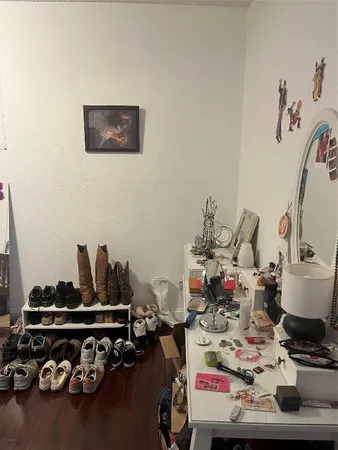 a kitchen with a sink cabinets and window