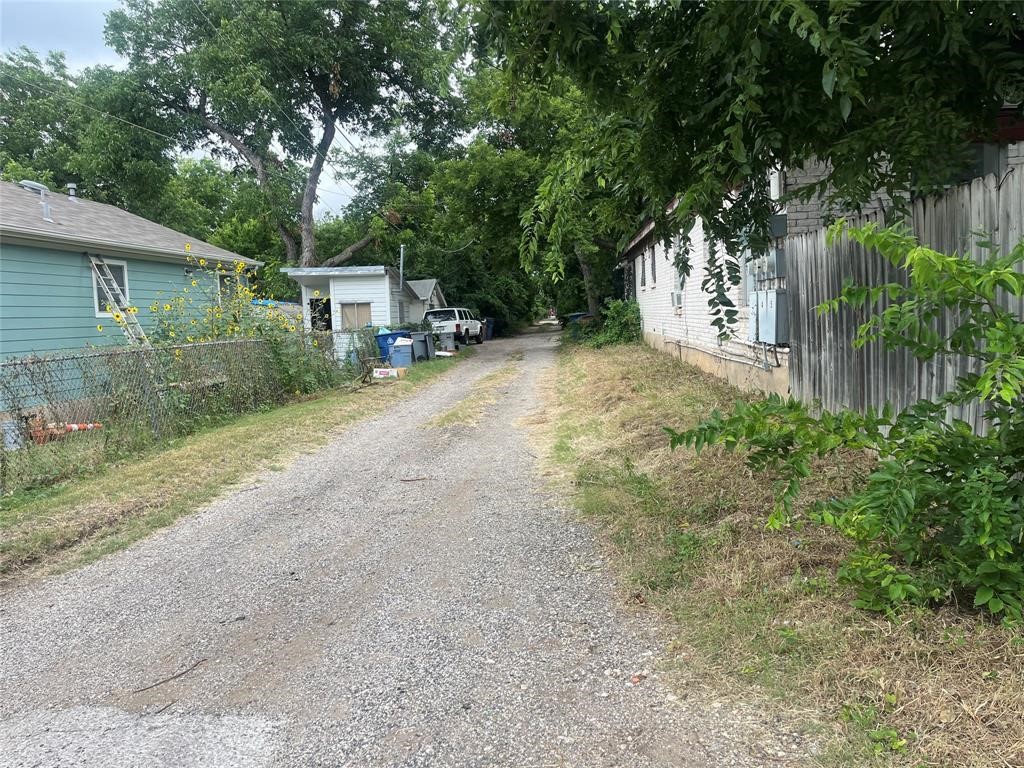 4627 Depew Avenue Austin, TX 78751 - Photo 29 of 30 a view of a house with a yard and garage