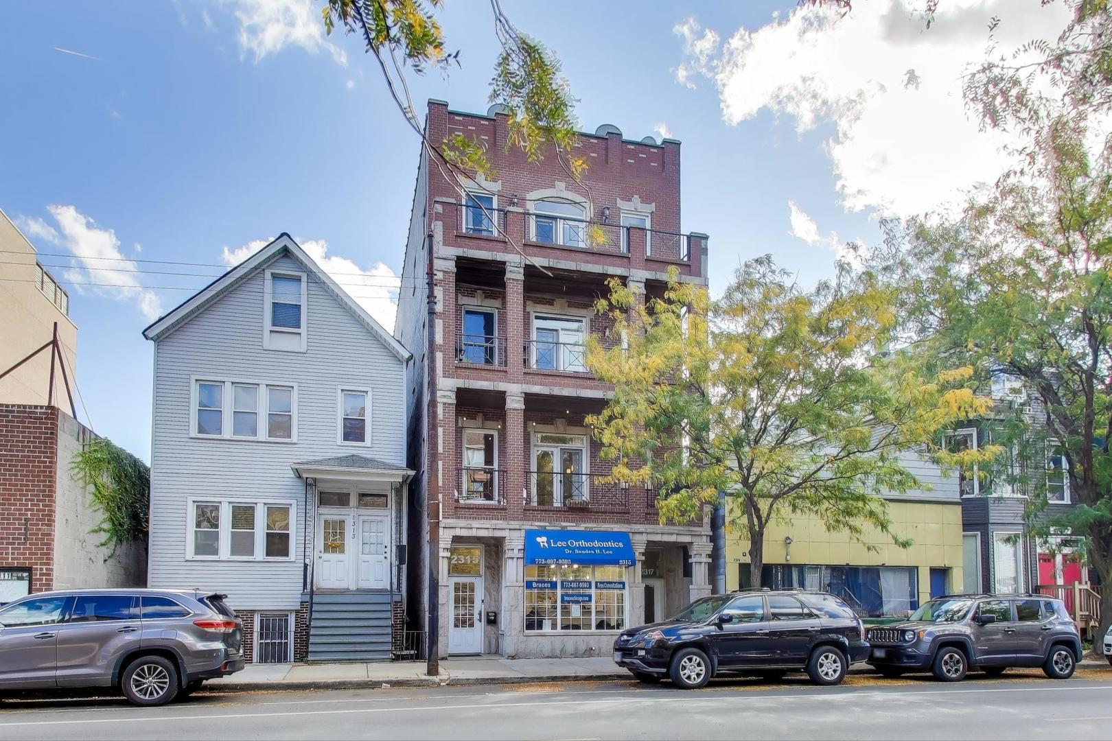 a car parked in front of a building