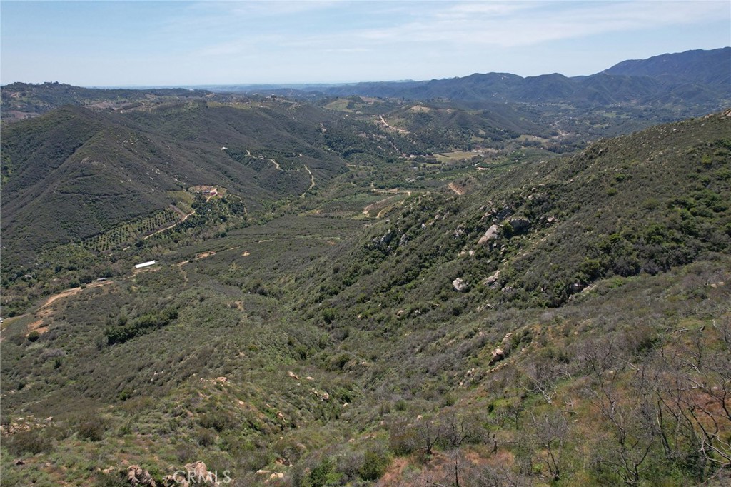 0 Crumley Court Temecula, CA 92590 - Photo 44 of 45 a view of a dry field with mountains in the background