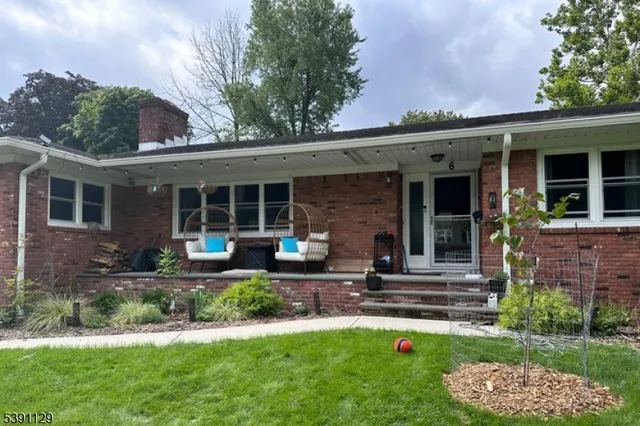 a house view with a garden space