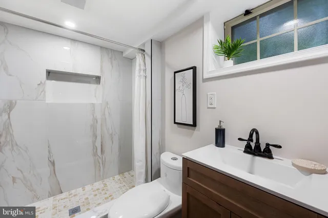 a view of house with a yard