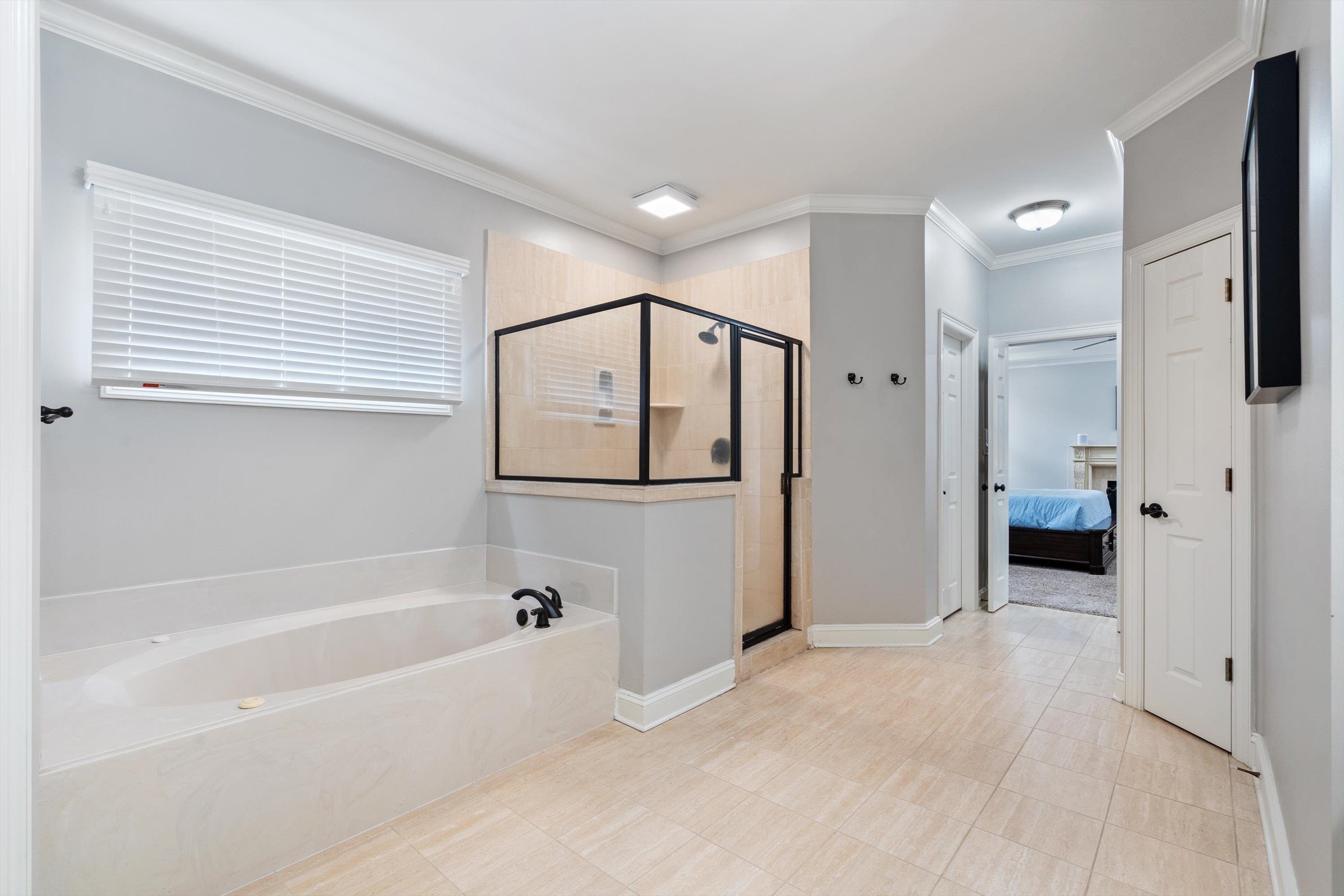 9335 Gresham Cove Germantown, TN 38139 - Photo 21 of 40 Primary bathroom with 2 closets and builtins