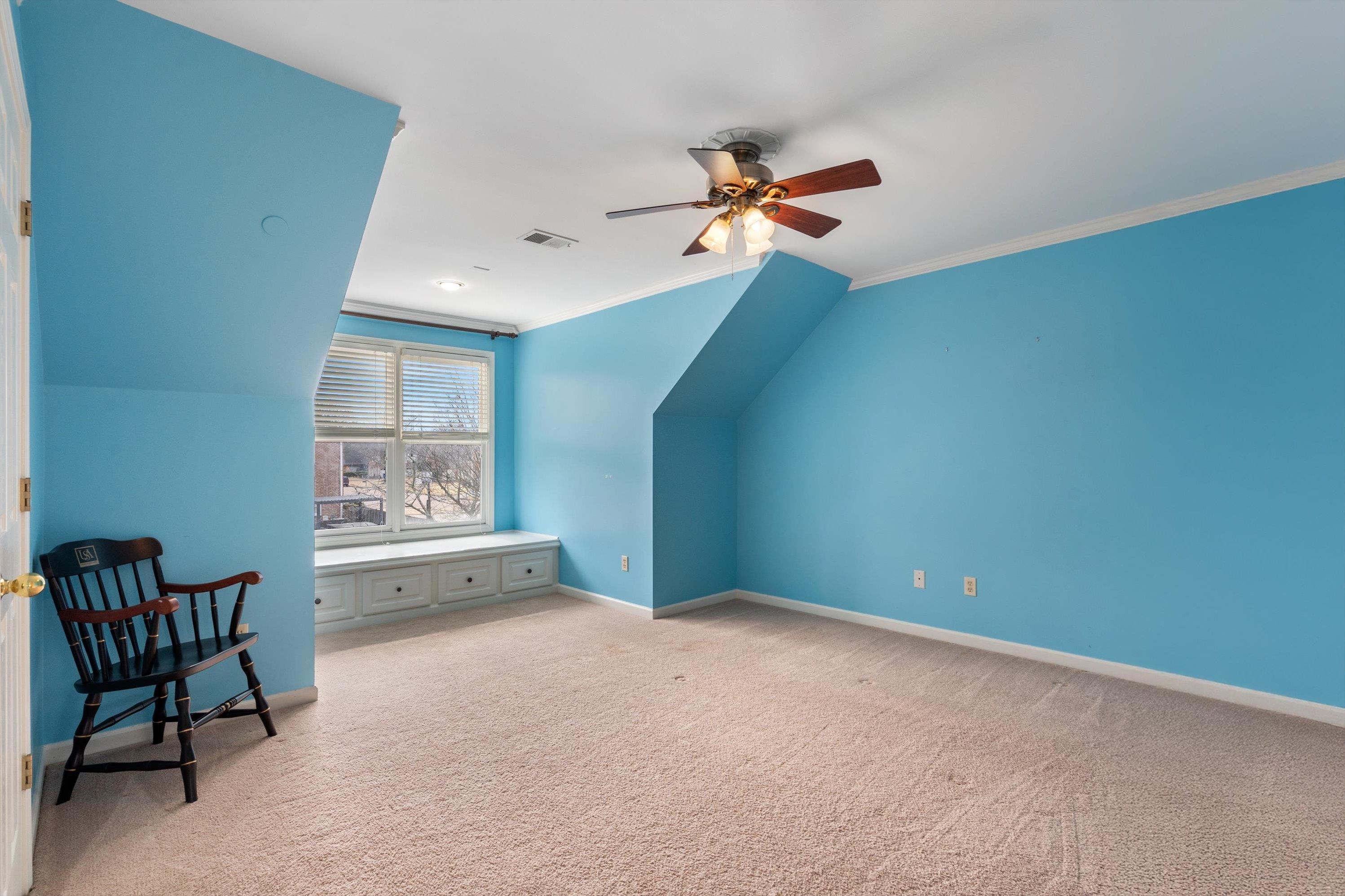 9335 Gresham Cove Germantown, TN 38139 - Photo 26 of 40 Upstairs bedroom with window seat and storage