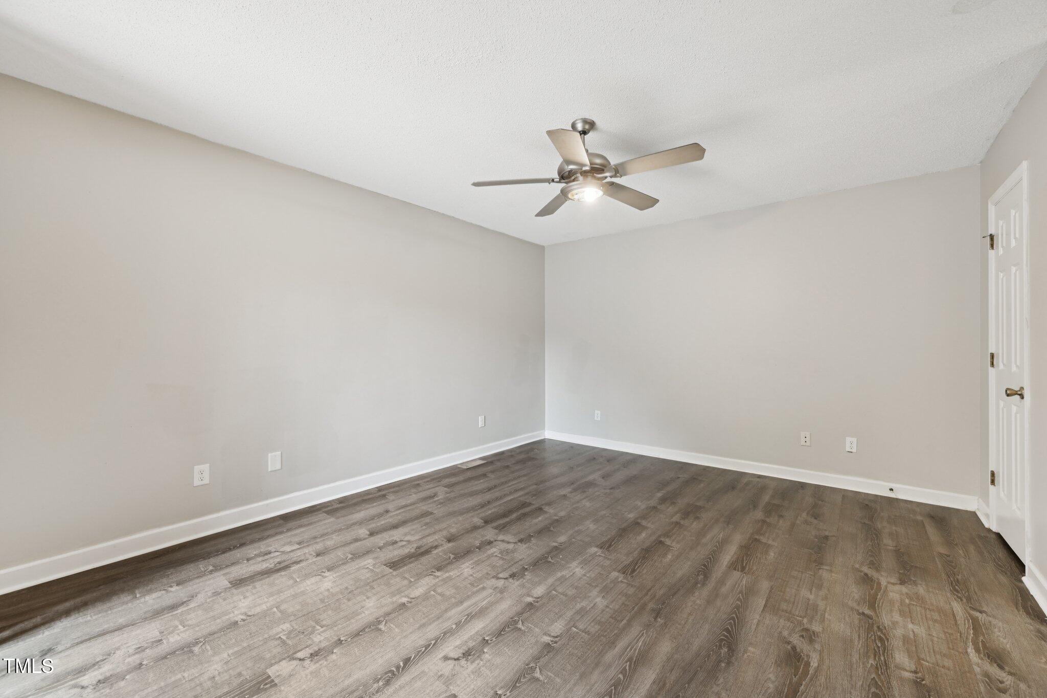 3534 Rawdon Drive Durham, NC 27713 - Photo 28 of 43 a view of empty room with wooden floor