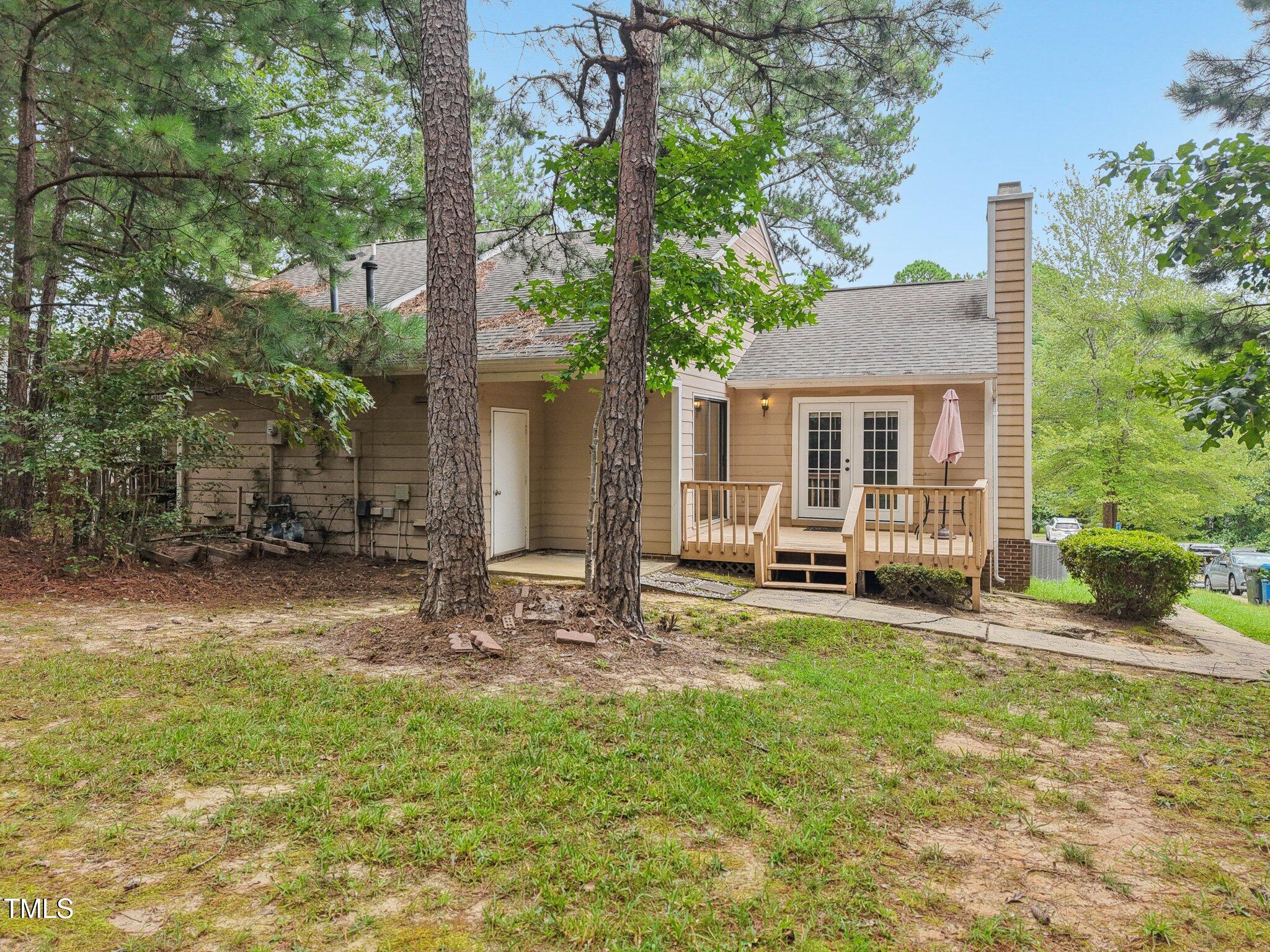 3534 Rawdon Drive Durham, NC 27713 - Photo 6 of 43 a view of a house with backyard and a tree