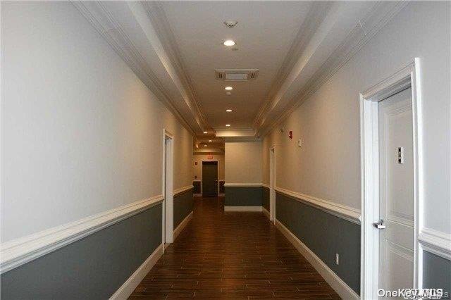 50 Stewart Avenue, Unit 3A Huntington, NY 11743 - Photo 12 of 13 a view of hallway with stairs