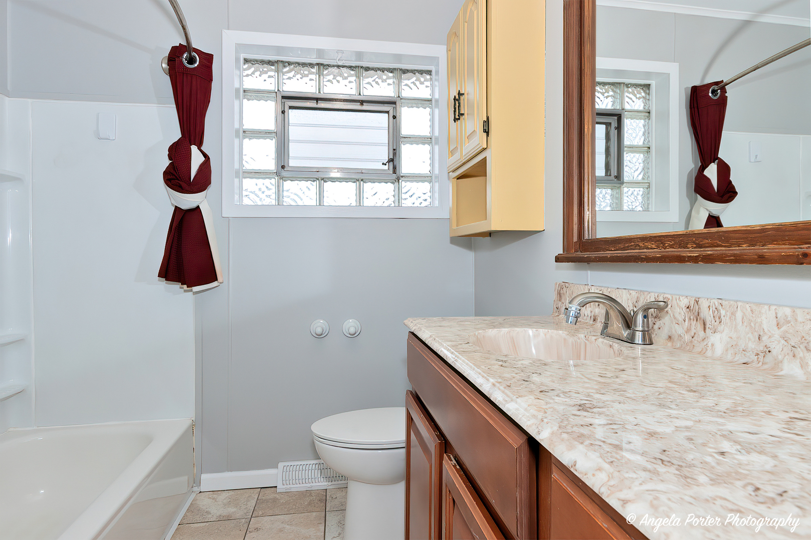 40 Pine Tree Row Lake Zurich, IL 60047 - Photo 11 of 31 a bathroom with a granite countertop sink a toilet and shower