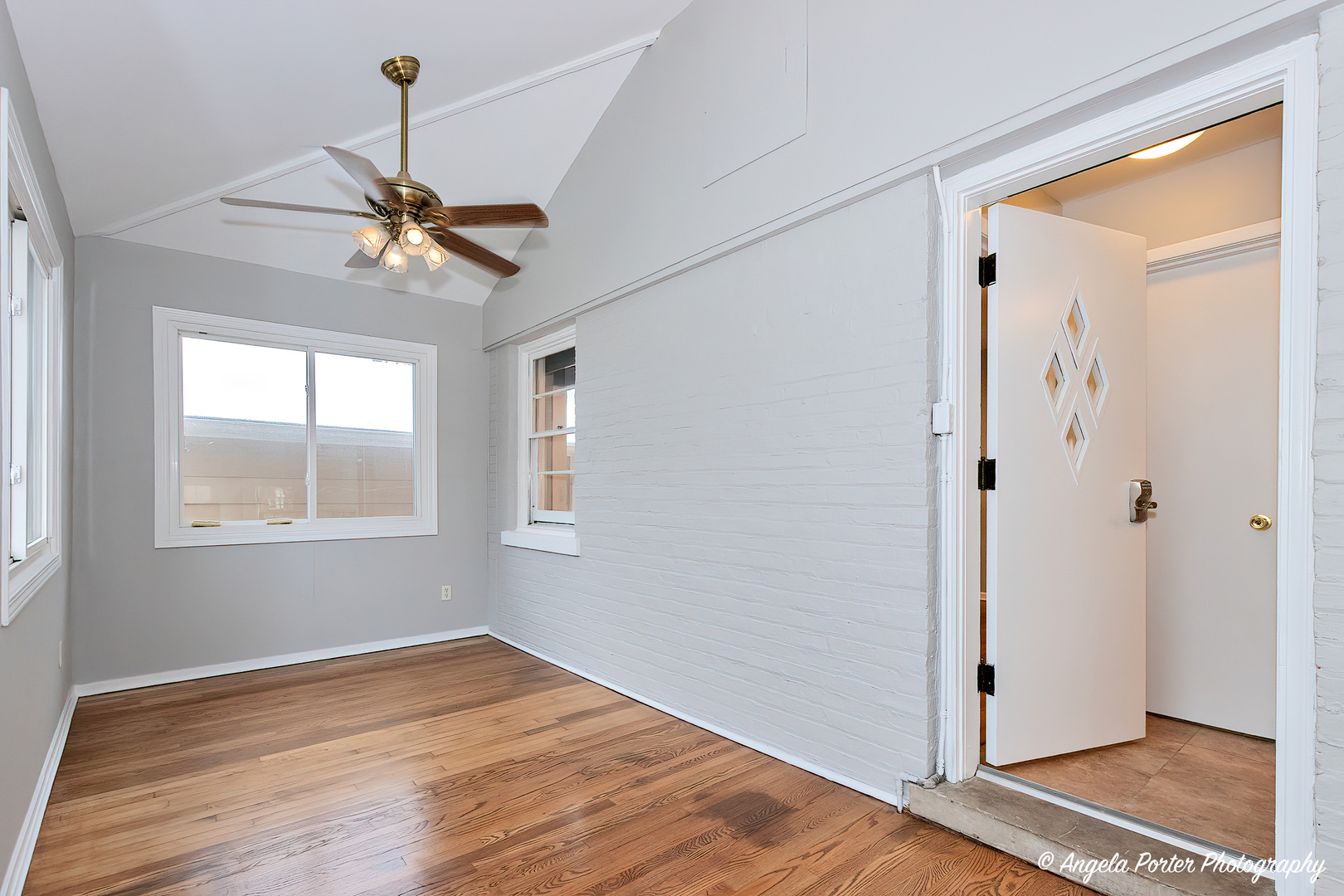 40 Pine Tree Row Lake Zurich, IL 60047 - Photo 15 of 31 a view of empty room with wooden floor and fan