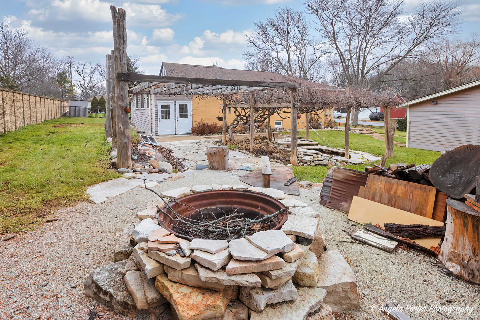 40 Pine Tree Row Lake Zurich, IL 60047 - Photo 27 of 31 a view of a patio with couches chairs and a fire pit