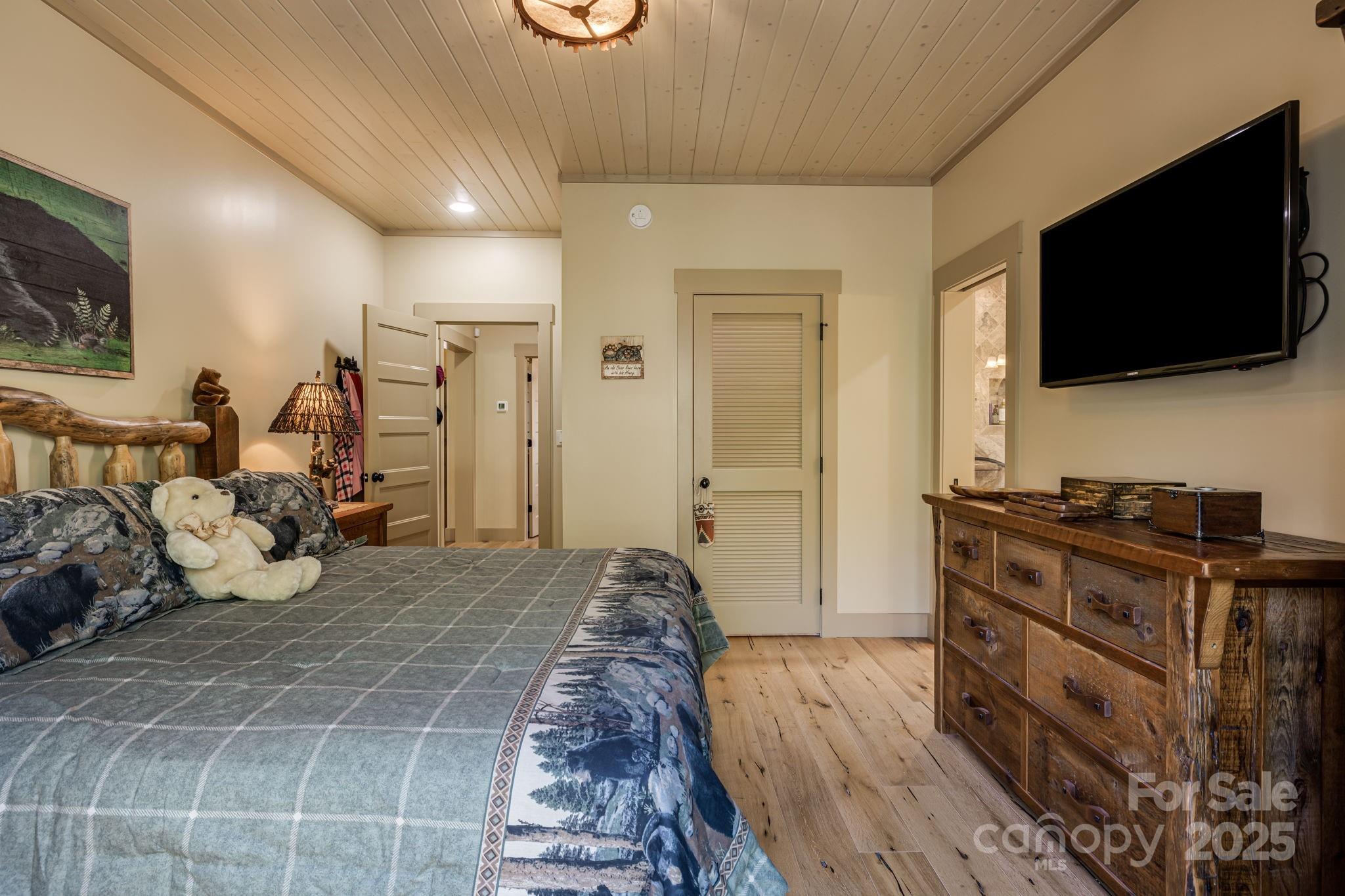 36 Chimney Stone Way Cullowhee, NC 28723 - Photo 23 of 47 a living room with furniture and a flat screen tv
