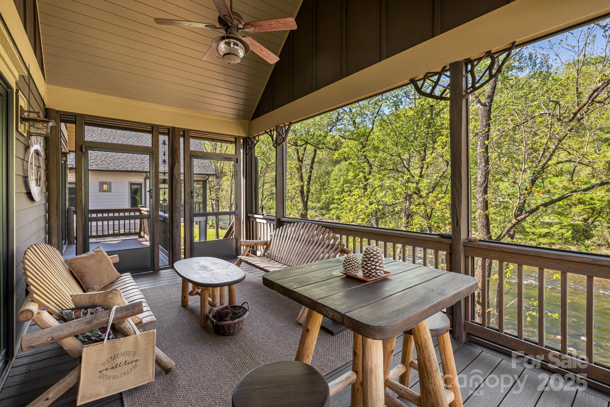 36 Chimney Stone Way Cullowhee, NC 28723 - Photo 29 of 47 a balcony with furniture and wooden floor