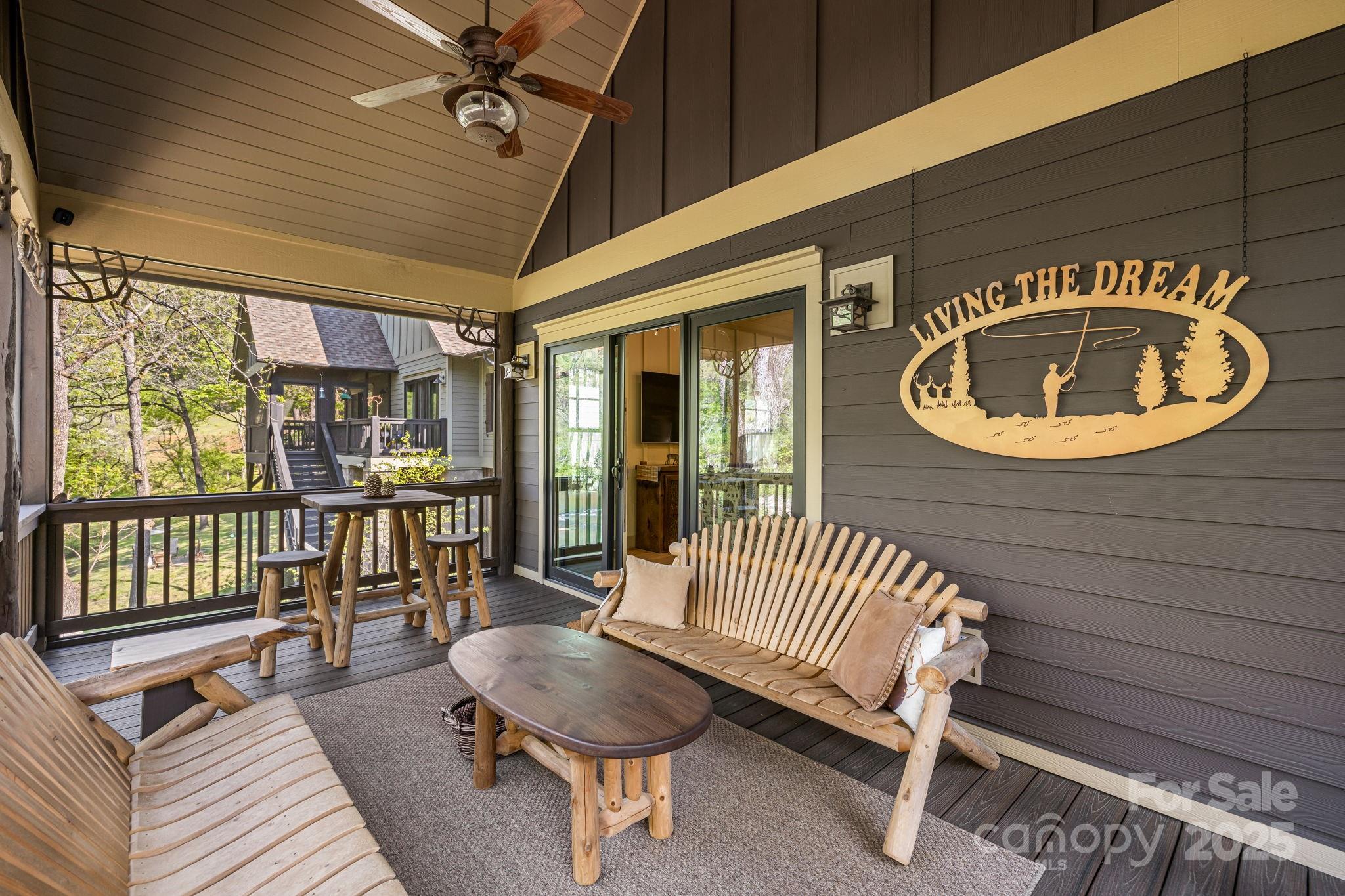 36 Chimney Stone Way Cullowhee, NC 28723 - Photo 31 of 47 a view of a porch with furniture