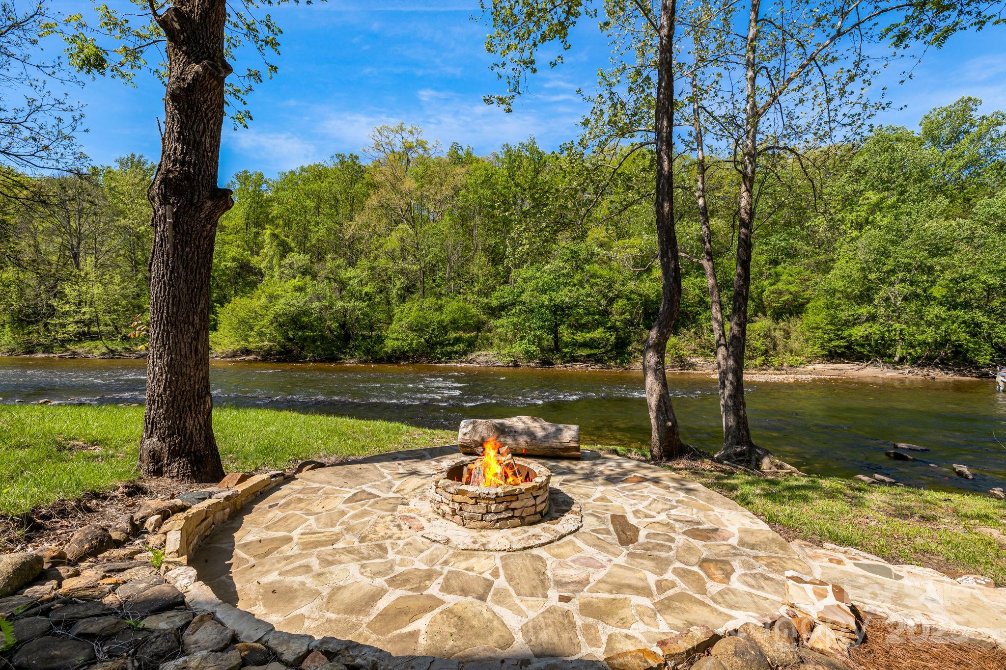 36 Chimney Stone Way Cullowhee, NC 28723 - Photo 38 of 47 a view of a lake with a tree