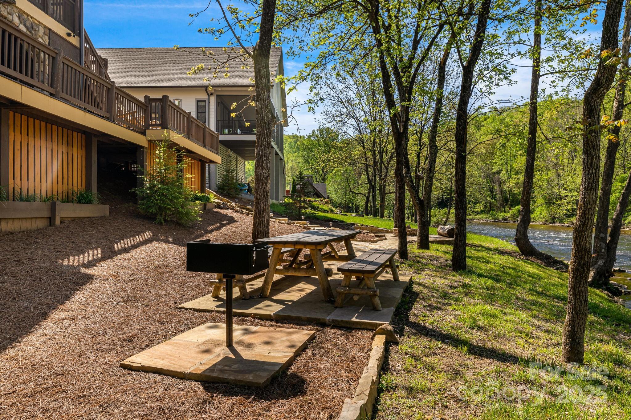 36 Chimney Stone Way Cullowhee, NC 28723 - Photo 40 of 47 a view of a chairs in a patio