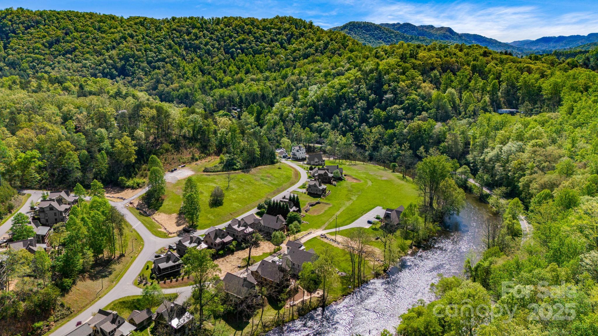 36 Chimney Stone Way Cullowhee, NC 28723 - Photo 45 of 47 an aerial view of a house with a yard