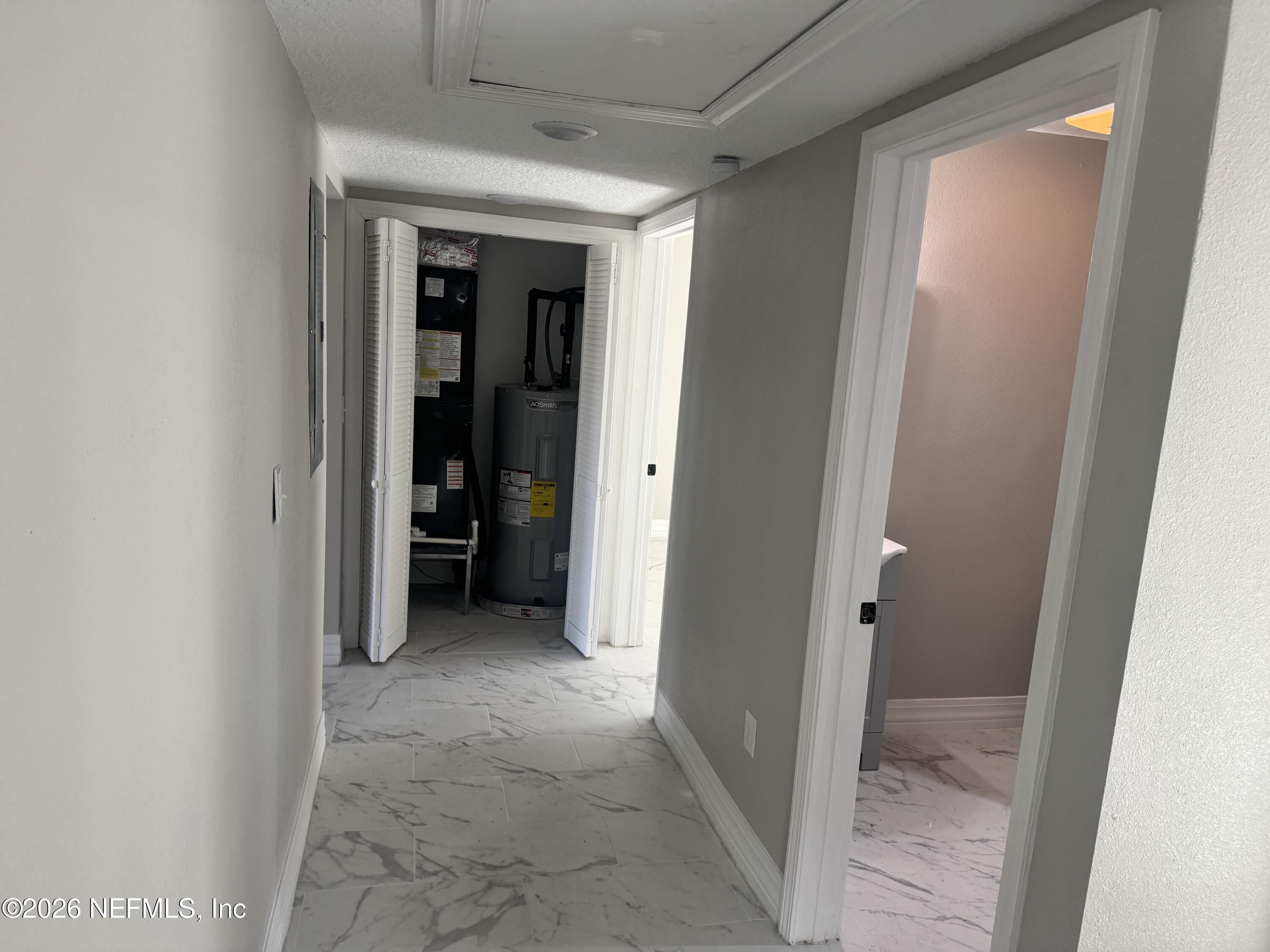 1718 Cornell Road Jacksonville, FL 32207 - Photo 25 of 41 a view of a hallway with an entryway and closet