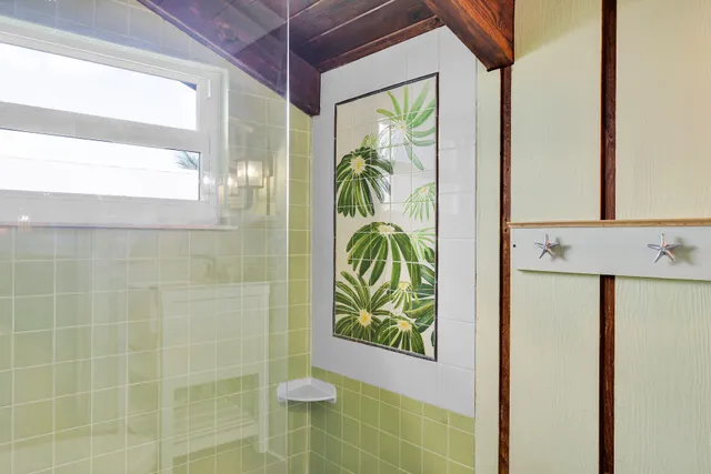 a view of hallway with wooden stairs