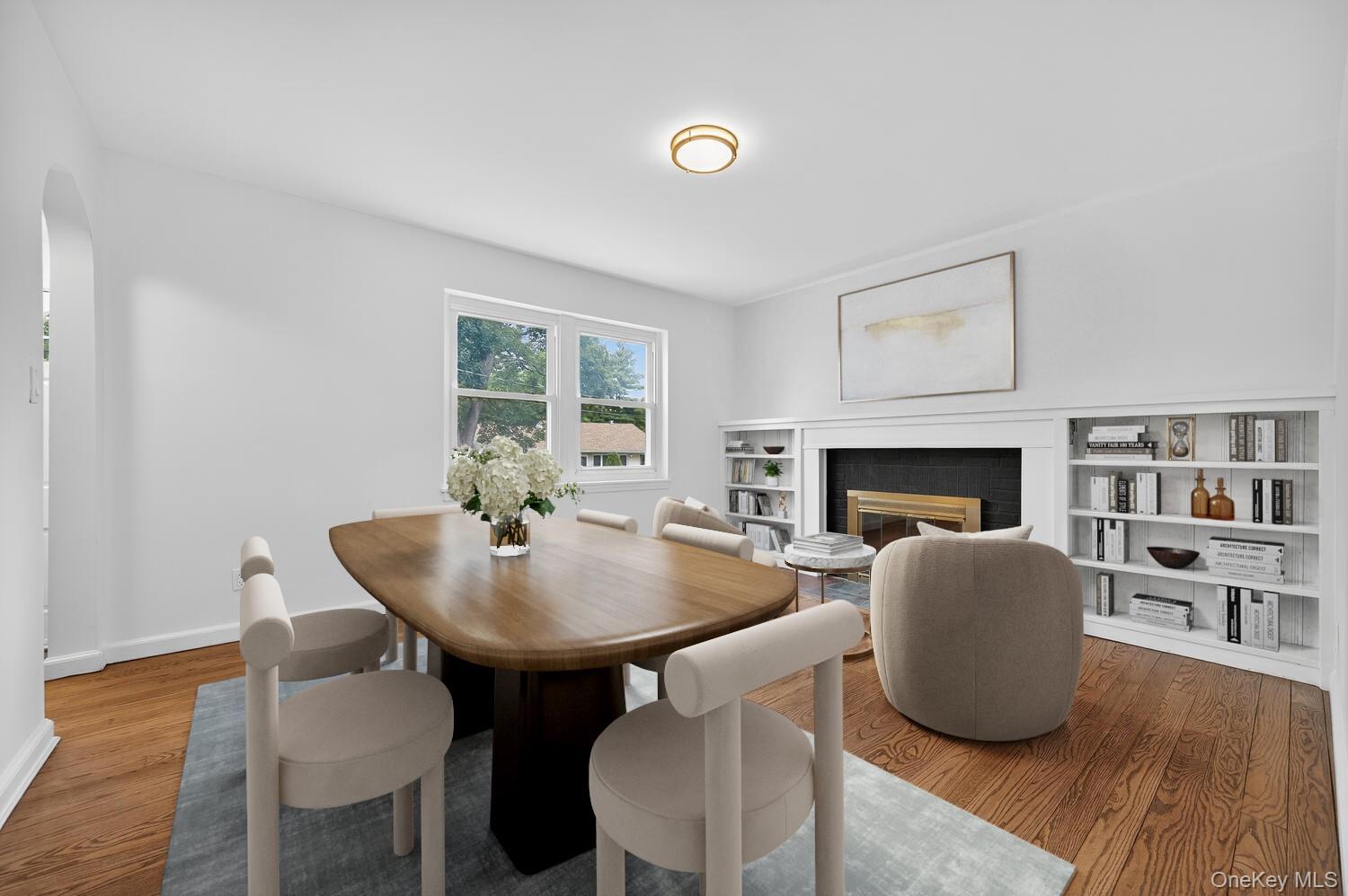 175 North Street Locust Valley, NY 11560 - Photo 4 of 40 a living room with furniture and a fireplace