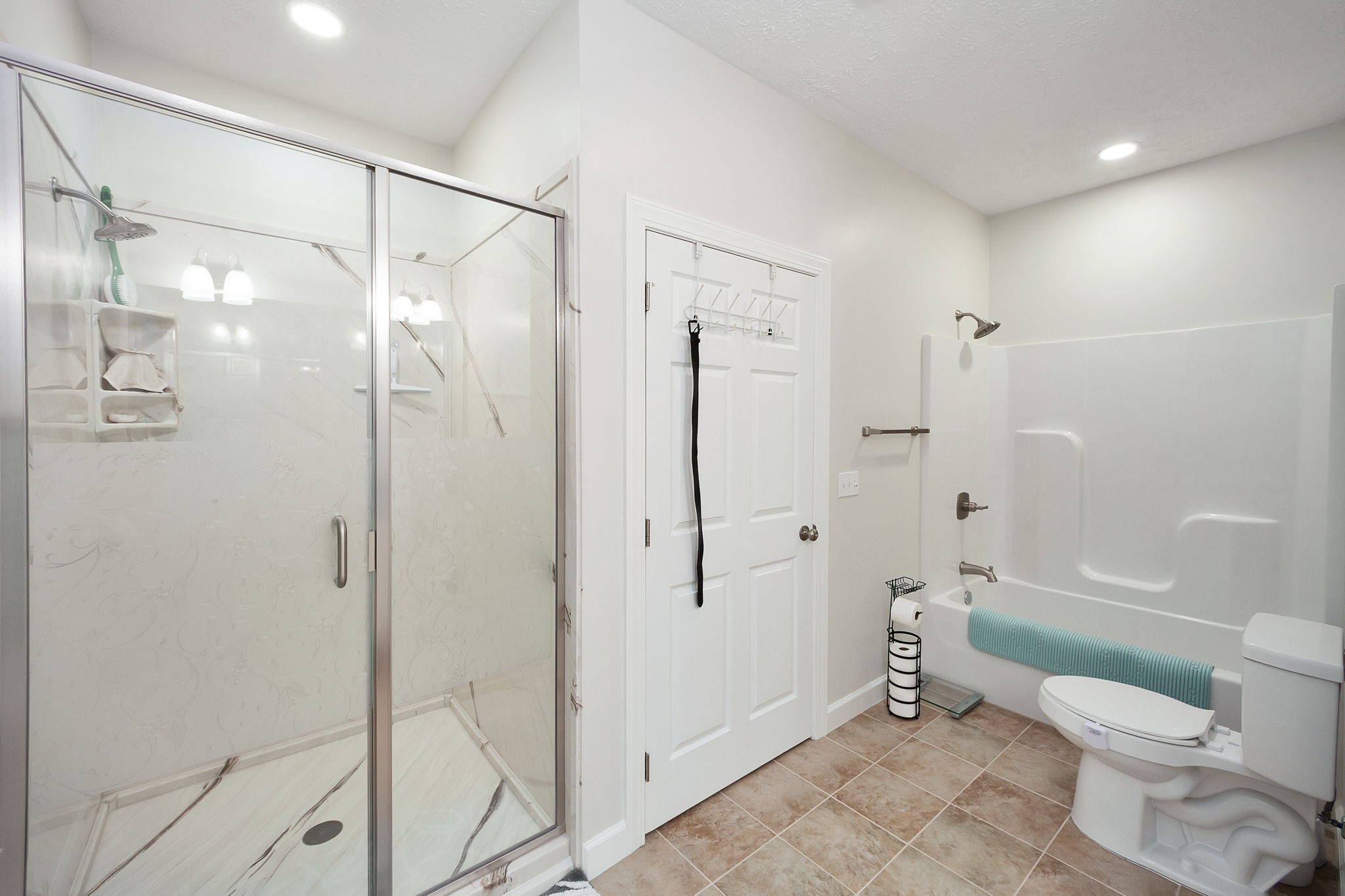 745 Alman Cemetery Road Paris, TN 38242 - Photo 15 of 31 a bathroom with a shower toilet and sink