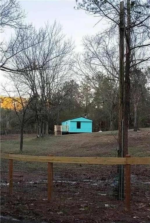 262 Blacks Bluff Road Southwest Rome, GA 30161 - Photo 4 of 11 a view of a yard with large tree