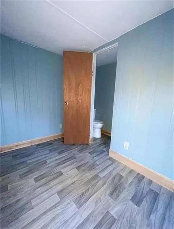 262 Blacks Bluff Road Southwest Rome, GA 30161 - Photo 5 of 11 a view of an empty room with wooden floor