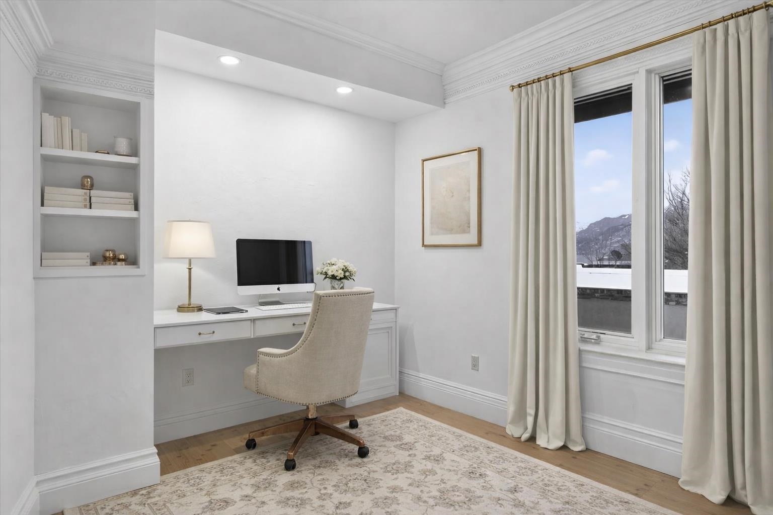 185 North Lena Street, Unit CONDO E Ridgway, CO 81432 - Photo 11 of 17 a view of a workspace with furniture and a window