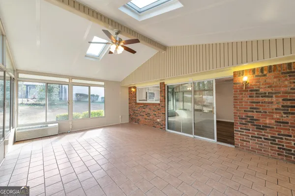 a view of empty room with windows