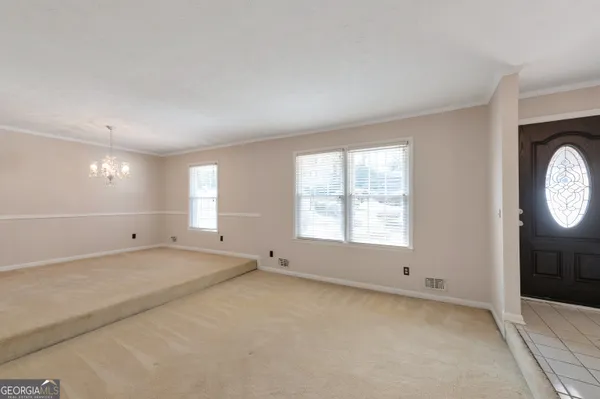 an empty room with windows