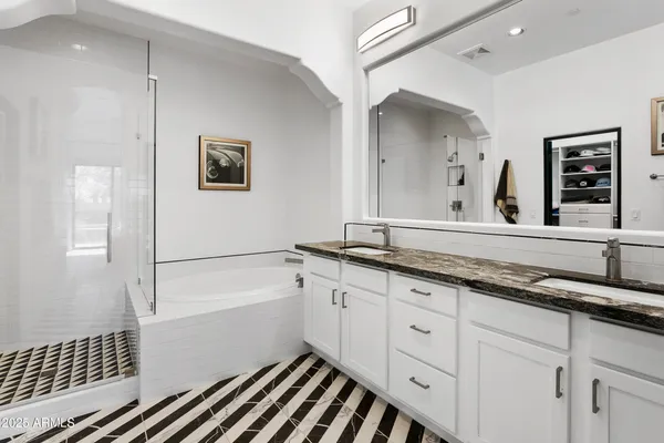 a bathroom with a sink and a bathtub