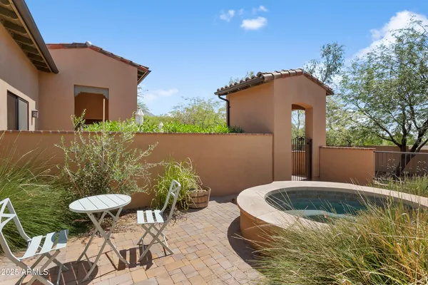 a view of a swimming pool with a yard