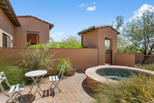 a view of a swimming pool with a yard