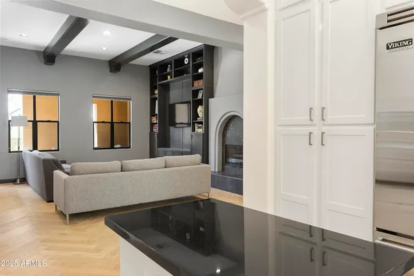 a living room with furniture and windows