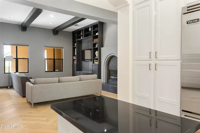 a living room with furniture and windows