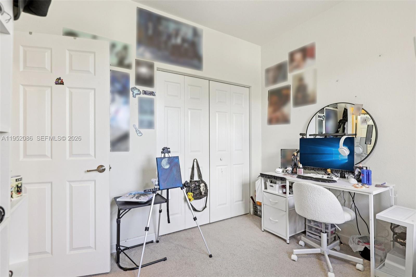 11746 Southwest 151 Avenue Miami, FL 33196 - Photo 18 of 37 a view of a workspace with furniture