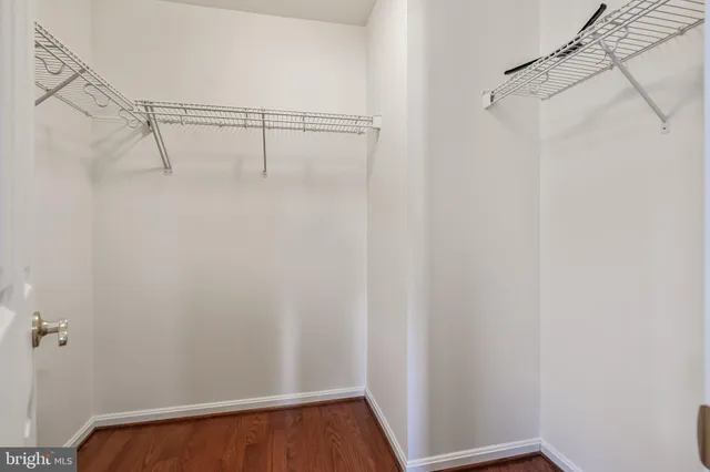 a bathroom with a shower sink and mirror