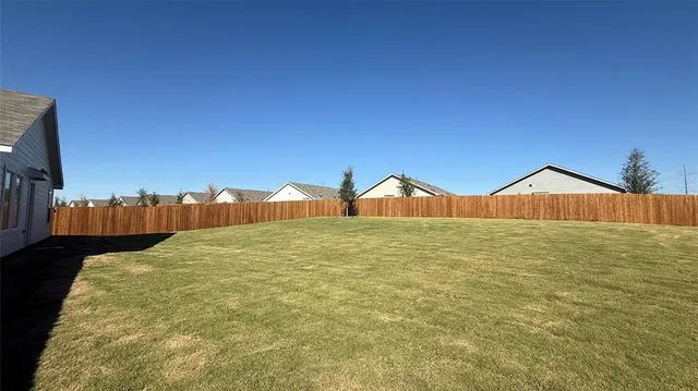 a view of an outdoor space and swimming pool