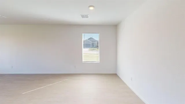 an empty room with a window