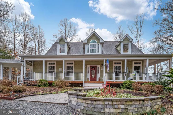 front view of a house with a rug