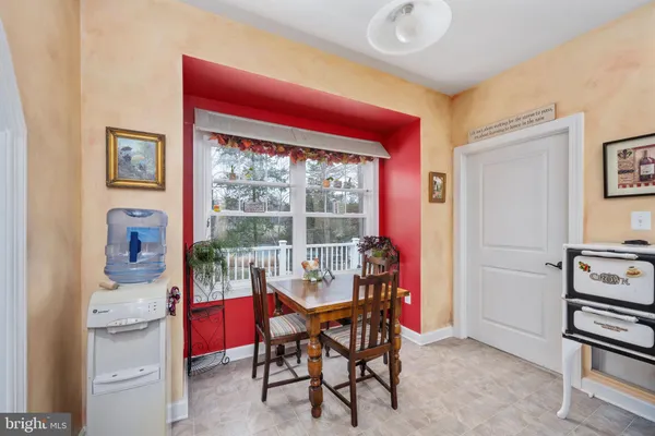 a kitchen with a sink stove and refrigerator