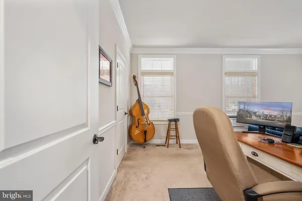 a view of livingroom with hardwood floor and ceiling fan