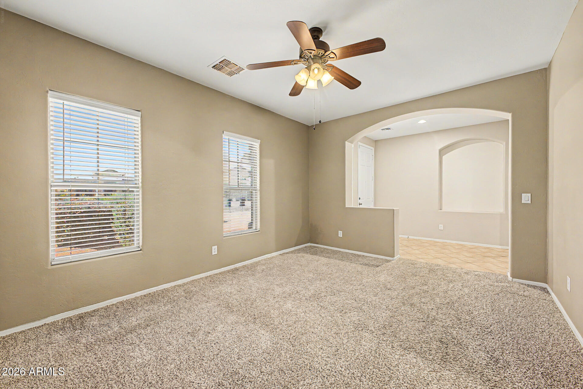 6622 West Harwell Road Laveen, AZ 85339 - Photo 6 of 32 a view of an empty room with a window